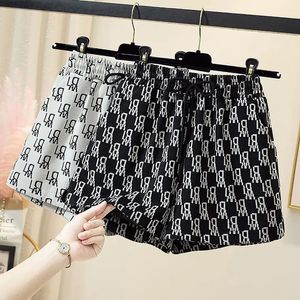 Gata casual tryckt brev shorts sommar elastisk midja lös plusstorlek trend breda ben byxor mode vintage kvinnor kläder 240517