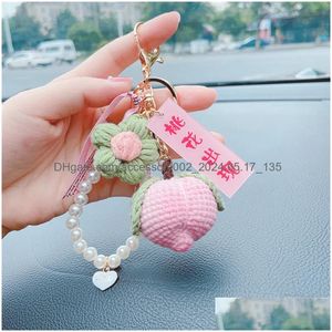 Keychains Bedanyards criativos trançados Stberry Peach Persimmon Flores pendentes Mulheres Bolsa Acessório Droga Droga Acessórios de moda Otkp3