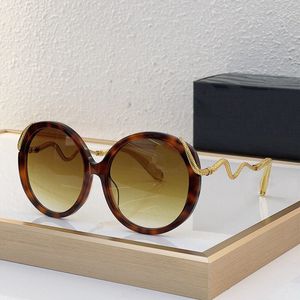 Kvinnors designer fashionabla solglasögon med runda linser och acetatfiberram ihopkopplad med fashionabla böjda ben C004M Kvinnor och mens lyxiga solglasögon