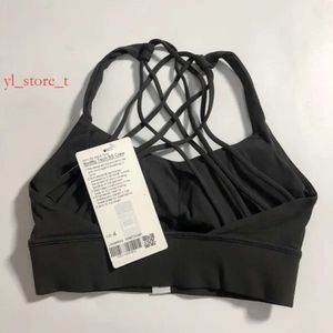 Ll designers yoga bh med bröstkudde kvinnor tillbaka kors bh snabb torkning andas underkläder gym som kör brassiere sexig mjuk fast färg racerback tank tops 32