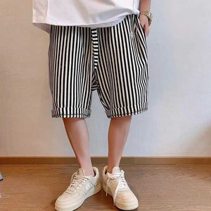 Męskie szorty 2024 Summerna wytwórnia moda High Street luźne swobodne pionowe paski pionowe wszechstronne ślimakowe spodnie dla mężczyzn J240516