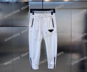 21sss Mens Designer Calças Paris Triângulo Rótulo Impressão Zipper homens calças letras casuais calças khaki escuro azul9150893