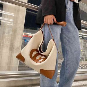 Design preguiçoso de grande capacidade de grande capacidade feminina nova bolsa de lazer versátil um ombro portátil bolsas 229s