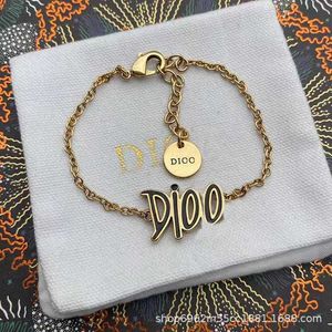 D Jia Di Jia Fashion Simple Black Enamel Bracelet/Earnail Letter Set/