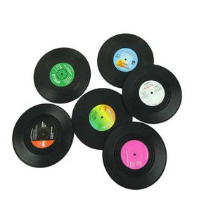 Mats Pads 2/4/6 pieces of vinyl record table beverage coasters decorated with vinyl record creative coffee roller coaster heat resistant mats J240514