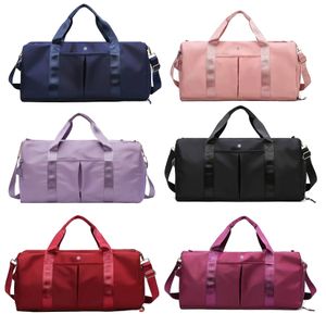 Luxury 2 storlekar lul utomhus resekoppling duffle påsar lululemens kvinnor mode tote handväska designer axel bagage väska mens hög kapacitet nylon crossbody väskor