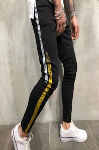 Nya stylistmens jeans mager med smal elastisk denim modecykel jeans män byxor rippade hål jean för män storlek 28406365940