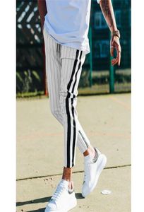 Modne mężczyzn w stylu Anglii Pasy Striped Pants Mężczyzna długie ołówki joggery swobodne spodnie do sznurka boczne paski spodni T2007061386641