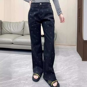 Kvinnors jeans södra oljekvalitet xiaoxiang 24 vår/sommar ny kamelia press lim temperament hög midja smalt rakt ben för kvinnor