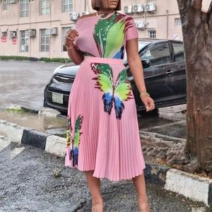2 Stücke Sets Damen -Outfit -Röcke und Top -gedruckte Bluse Kurzarmrock plissierte Mittelkalb Elegante afrikanische Damenkleidung 240518