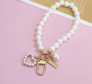 Pearl Shell Car Keychain Creative Retro Pearl Bracelet Beaded Bag Mobile Phone Hanging Protective Case Hanging Accessories