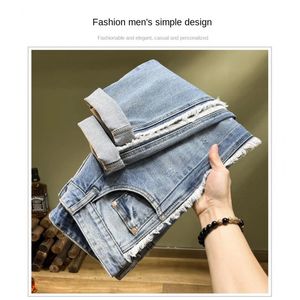 Highend Personality Splicing Raw Edge Hole Mens Jeans Influx Of Elastic Slim Embroidery Patches Small Leg Pants 240508