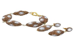 Guaiguai Jewelry Cultured White Keshi Pearl Yellow CZ 도금 타원형 너겟 구슬 브레이슬릿 귀걸이 세트 여성용 수제 4920156