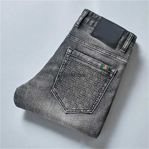 Calça de algodão de algodão da moda de primavera calça de negócios elásticos de abelha elástica calça clássica de estilo masculino de jeans cinza 28-38