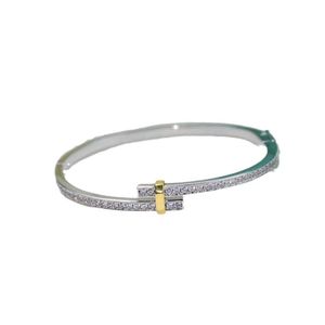 Heiße Auswahl hochwertiger modischer Trends Eingelegtes Zirkon dual Farb geteiltes elektrisches Kreuz Armband