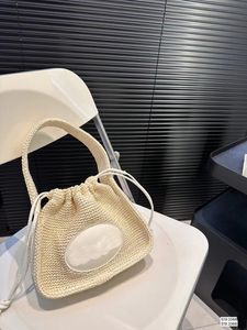 2024 Saco de cordão de empate malha com nervuras primavera e verão novo estilo luxuoso feminino designer de bolsa chanfal bolsa de axila de moda feminina para feminino bolsa de compasso de compasso