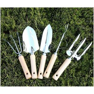 Other Garden Supplies High-End Gardening Wooden Handle Stainless Steel Tool Set Hand Shovel Loose Fork Trident Rake Ing Hine Drop De Dhmyd