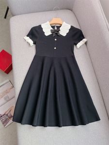 2024 Summer Black Contrast Color Ribbon Tie Bow Knitted Dress Short Sleeve Peter Pan Neck Panelled Short Casual Dresses Q4W170306