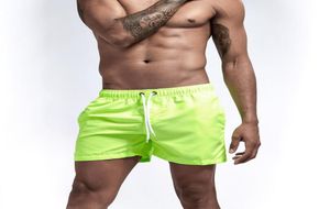 Verão 2019 Novo short de shorts de shorts de masculino rápido Quick Dry Surfing Shorts Awear Afuture Beach Masculino Curto Runnando Ginásio Pant curto Man Plus Size Tru8381501