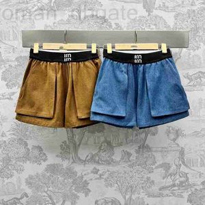 Shorts femminile Designer Lettera di tendenza alla cintura intrecciata giuntura a vita alta pantaloncini di jeans per le donne 2024 primavera/estate Nuovi pantaloni caldi versatili a gamba larga 34ua