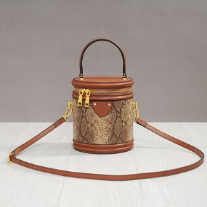 Genuine leather women's bucket handbag, cylindrical single shoulder crossbody bag, small 2021 new model