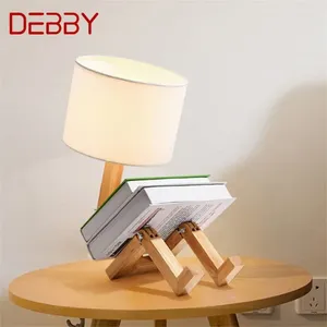 Bordslampor Debby Nordic Lamp Creative Wood Person Desk Lysning Led Dekorativ för hem sovrumsstudie