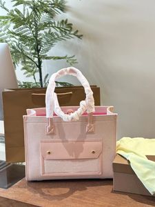 Tela rosa de alta qualidade com bolsa de ombro de moda de nicho de couro de couro bolsa de ombro grande 34*25