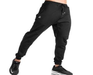 Jesień zima nowe mężczyźni Pants Gyms Casual Elastic Mens Fitness Trening Spodnie chude spodnie spodnie do jogger spodni z MXXL6093946