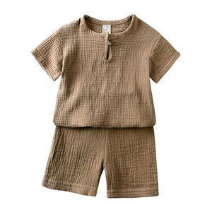 Zestawy odzieży Dziecięce górne i dolne dziewczyna z krótkim rękawem sukienka Baby Baby 2023 Modna T-shirt i szorty dziecięce letnie odzież Q240517