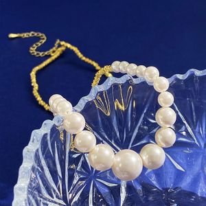 Jóias de luxo femininas de colar de grife, cheias de diamantes Saturn planeta versátil luz luxuosa clavícula high -end bead de retalhos de retalhos de colar de pérolas