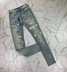 HM359 High quality Mens jeans Distressed Motorcycle biker jean Rock Skinny Slim Ripped hole stripe Fashionable snake embroidery De4934127