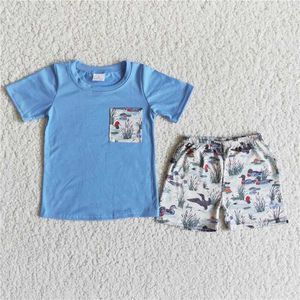 Kläderuppsättningar Ny sommar Populära fickdesign Flower Shorts Set Baby Boys and Childrens Boutique Wholesale Clothing Set Q240517