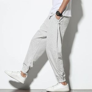 Spring and summer round buckle striped harem pants for mens breathable cotton linen pencil pants with buckle casual floral pants 240515