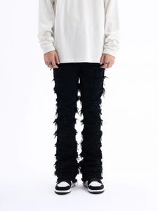 Styl amerykański Czarna erozja uszkodzona szorstkie dżinsy z High Street Mens Ins Hip-Hop Fashion Vintage Chude Pants Streetwear 240518