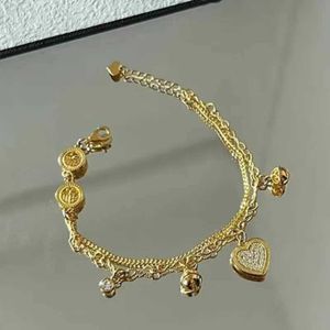 Charm Bracelets ANENJERY Gold Heart shaped Zircon Pendant Bracelet with Double Layer Chain Charming Valentines Day Jewelry for Women J240518