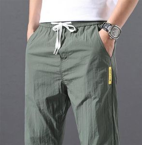 Summer Men Pants Sports Outdoor Casualne spodnie Solidny kolor elastyczny talia lekka wygodna długa męska spodnie plus rozmiar 2207141784377