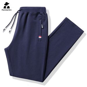 Jesienne spodnie Mężczyźni Fitness Sportswear dres elastyczne talia dresowe bawełniane spodnie luźne siłowni joggera spodnie mens m-8xl 240510