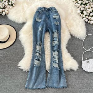 Kadınlar Kot pantolon için yüksek bel denim parlama pantolonları Sokak kıyafeti bahar sonbahar moda yırtık delikler ince kadın büyük boyutlu pantolonlar s-5xl