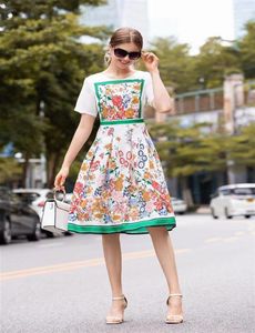 Europäische und amerikanische Damen tragen 2020 Sommer Neuer runder Kragen Big Brand Fashion Farbe Blumendruck Mediumlänge Slim Dress3330254