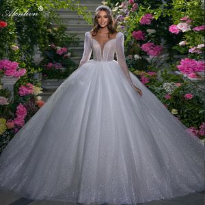 Spitzige Spitze Deep V-Ausschnitt A-Linie Hochzeitskleid Perlen Perlen Full Sleeves Prinzessin Brautkleider mit zartem Bling Tüll bestickt