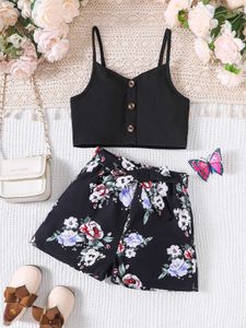 Kläder sätter flickor sommar ny trendig smal fit set med liten v-hals svart rem tank top och blomma tryckt shorts två bit set y240520we2q