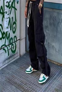パンツ黒人男性女性1高品質のマルチボタンポケットカーゴパンツドローストリングジョガースウェットパンツ1592400