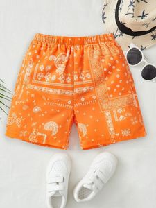 Pojkar och flickor avslappnade andningsbara shorts coola och bekväma i sommartryckta mönster fashionabla shorts 240425