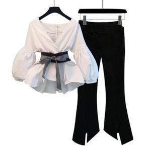 Kvinnor Två stycken set randig vit vneck -blus med skärmar och delad blyertsbyxa kläddam 2020 Spring Autumn Fashion Suits6880357