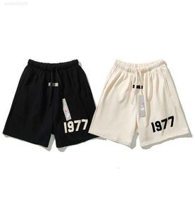 Casual Sports Pants sezon 8 podwójna linia 22SS High Street Lose 1977 Flocking Dripstring Shorts Modne spodnie STUDY3600156