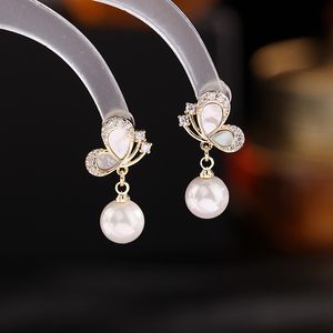 Japanischer koreanischer Sinn für französische Ohrringe Designer Schmuck Perlen Ohrring S925 Silbernadel Kurzer Zirkon Schmetterling für Frauen