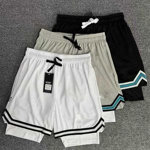 Shorts americanos masculinos calças de basquete de duas camadas de três pontos de malha de malha falsa de duas peças shorts esportivos soltos shorts