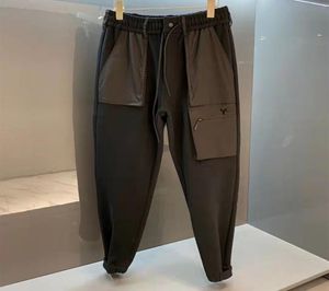 Calça masculina designer homens de calça de calça longa calça moles de moletom de poliéster Casual Sports Sports Splicing Pocket Design Zipper Casual Trousers3953483