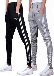 Vår sommarmens byxor mode mager sweatpants herrar joggar randiga smala monterade byxor gym kläder plus storlek 3xl harem byxa c1921303