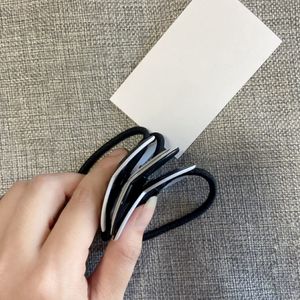 Fashion simple black & white acrylic head rope rubber band hair ring hairpin popular headwear jewelrys in European and American countri 319o